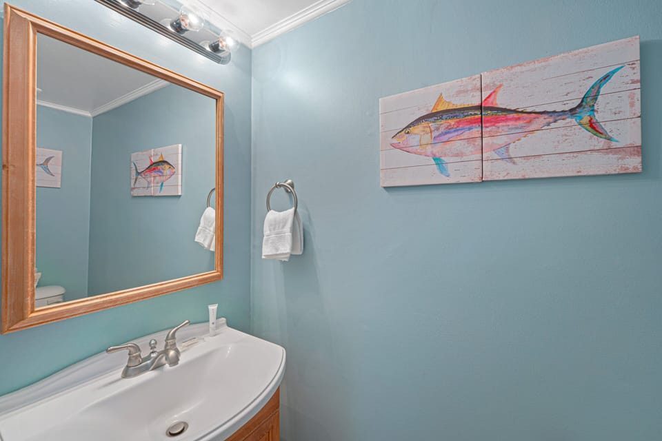 This half bath is bright, clean, and thoughtfully finished—perfect for guests and everyday convenience.