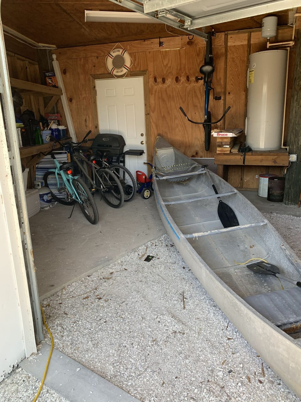 beach gear, bikes, grill, canoe