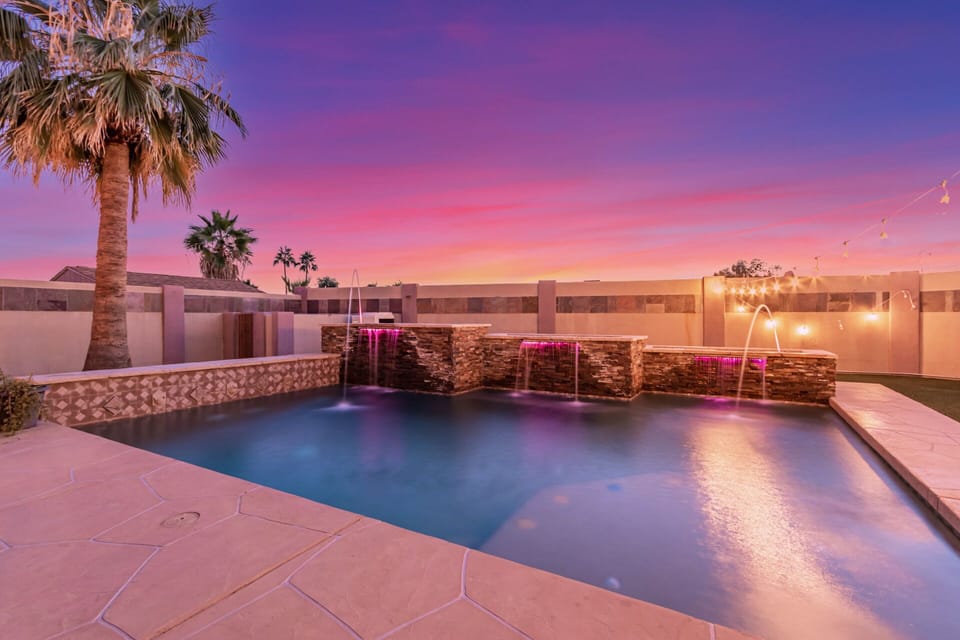 Heated pool with 5 waterfalls. 