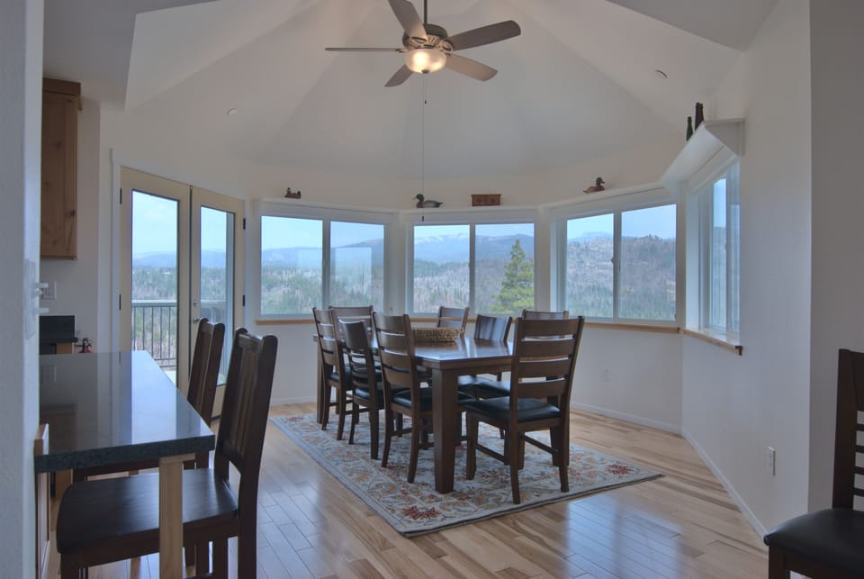 The dining area  itself has wrap-around views and comfortable seating for 8-10