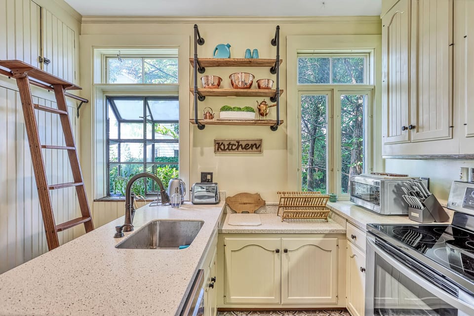 Kitchen with original cabinet & ladder