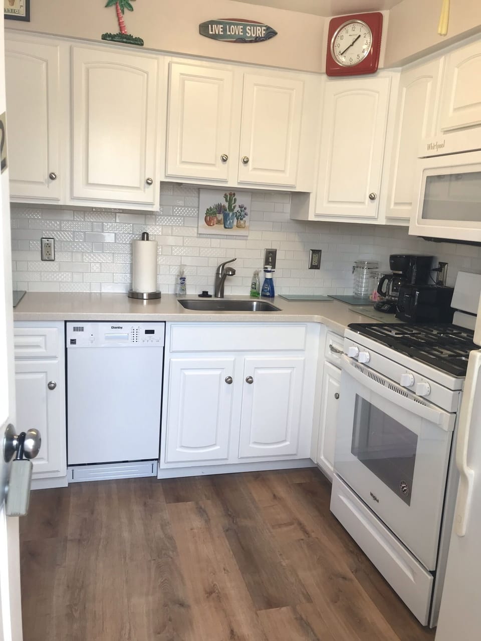 Kitchen. Dishwasher. Full sized Fridge. Gas Stove.