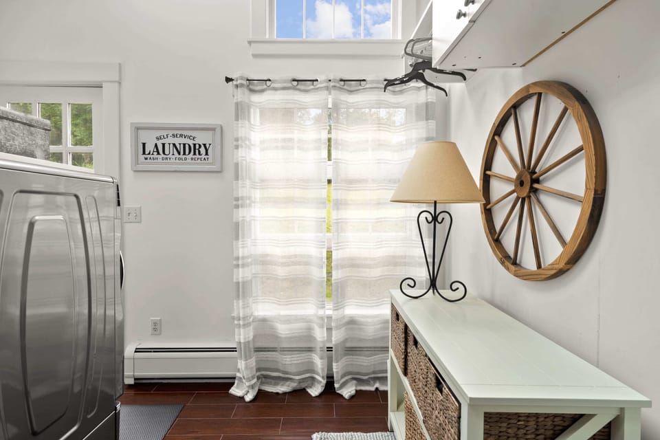 Convenient laundry room located in the master bedroom