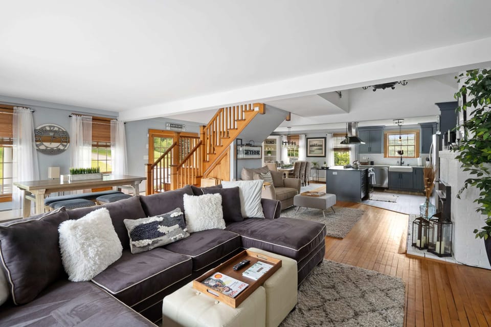 Living room space, open to both the dining room and kitchen