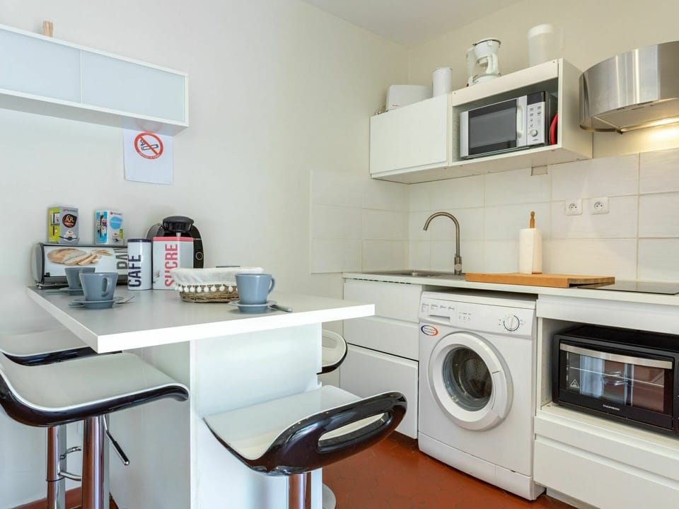 Furniture, Cabinetry, Property, Countertop, Product, Kitchen Appliance, Kitchen Stove, Home Appliance, Interior Design, Kitchen