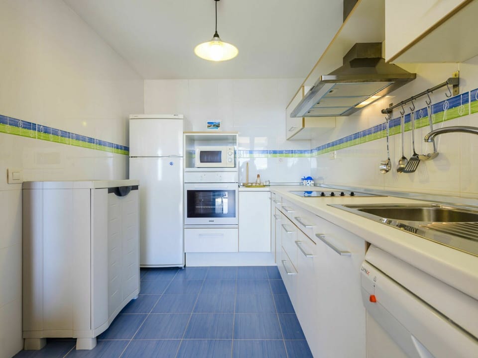 Cabinetry, Building, Property, Kitchen Appliance, Countertop, Lighting, Home Appliance, Interior Design, Kitchen, House