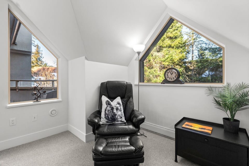 A cute reading nook in the corner of the lounge for those sleepy afternoon naps after a day on the slopes.