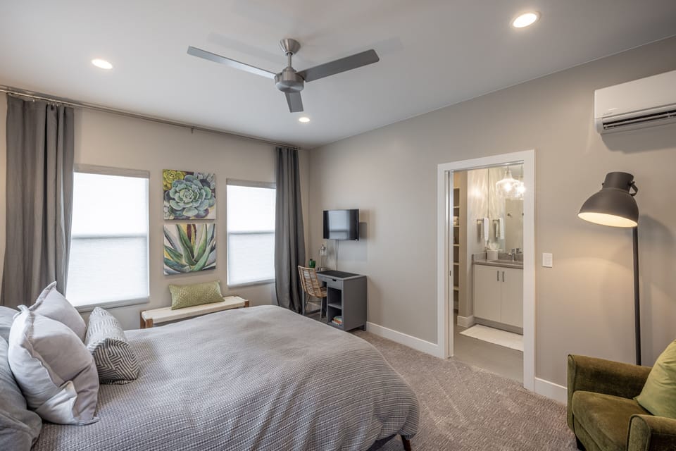 Casita Bedroom - The casita has private access with a Queen bed, private TV, closet, and bathroom.