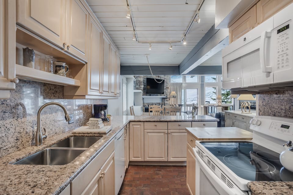 Full kitchen with granite countertops