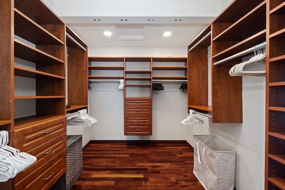 Expansive walk-in closet in the primary suite with ample storage for all your needs.