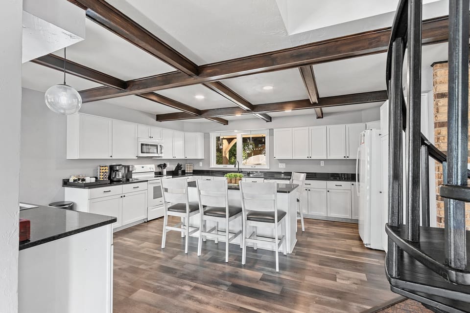 The kitchen’s open design encourages togetherness, making cooking a part of the entertainment.