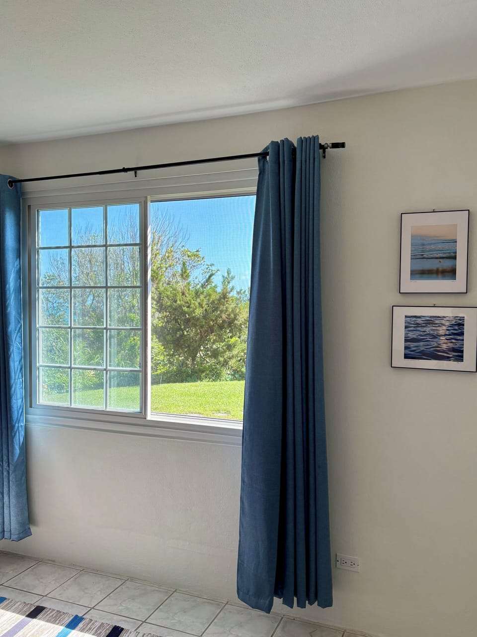 6’ window facing ocean and manicured lawn