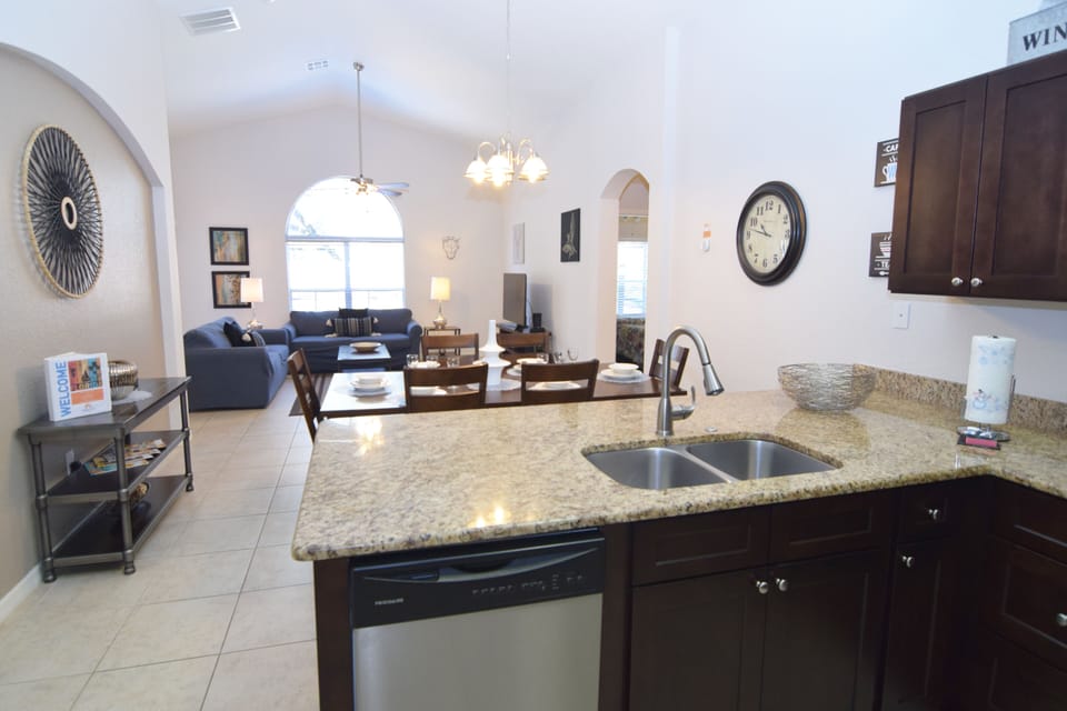 Modern kitchen with breakfast bar and everything you need to dine at home