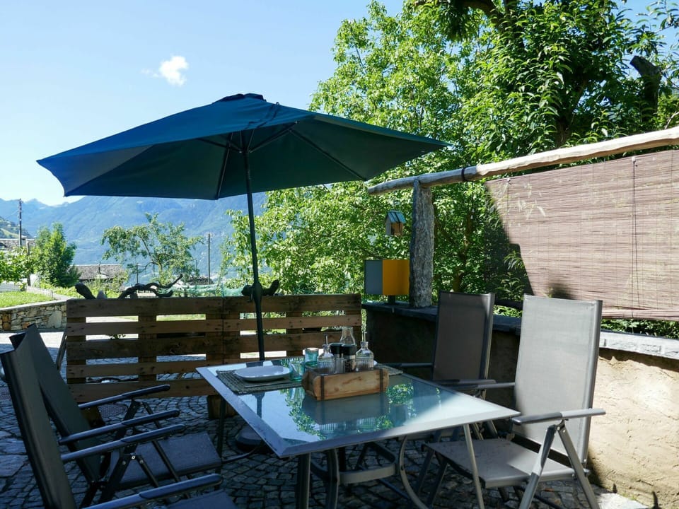 Table, Sky, Furniture, Plant, Property, Building, Chair, Outdoor Table, Shade, Outdoor Furniture