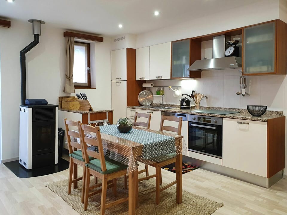 Countertop, Furniture, Cabinetry, Property, Table, Chair, Kitchen, Wood, Kitchen Appliance, Interior Design