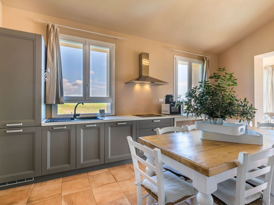 Furniture, Kitchen, Interior Design, Kitchen Appliance, Countertop, Cabinetry, Major Appliance, Wood, Flooring, Ceiling