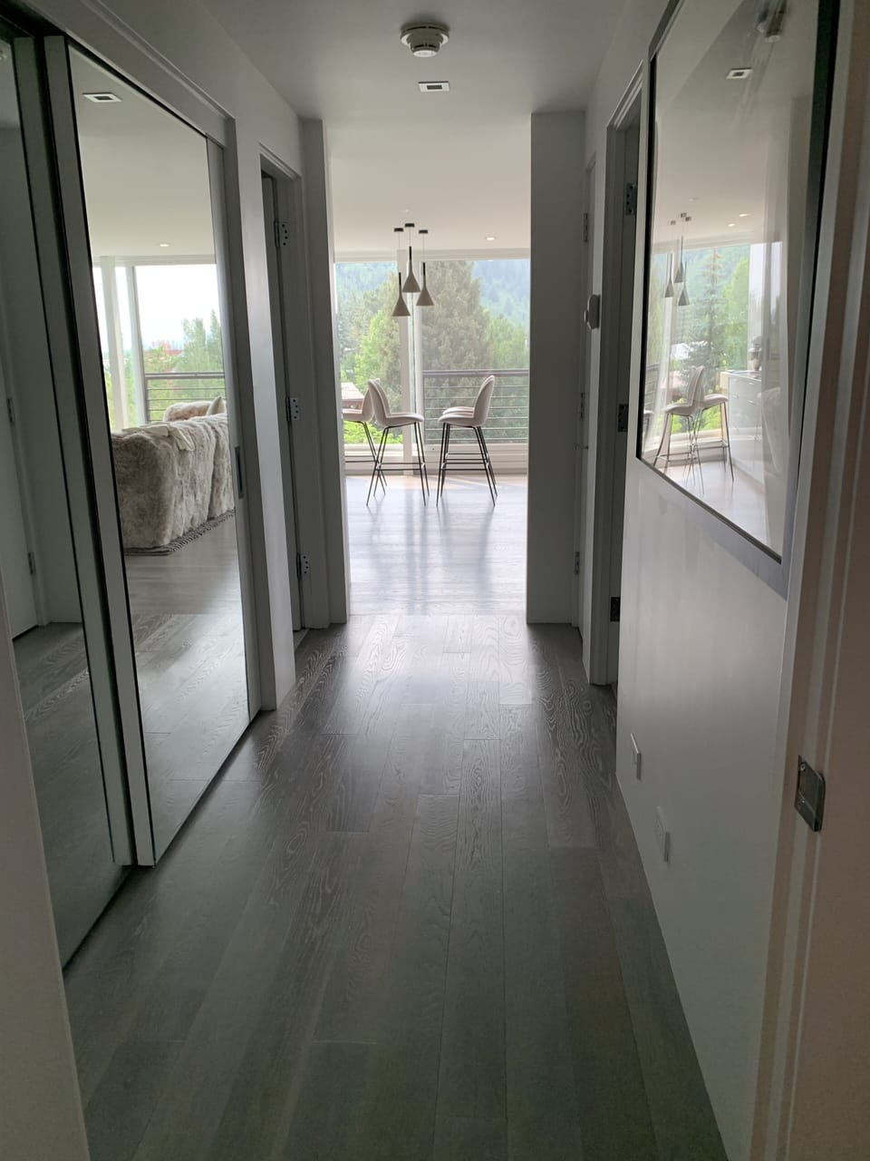 hallway with large mirrors