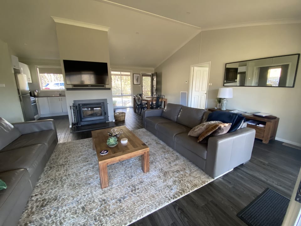 Living area with slow combustion fire place