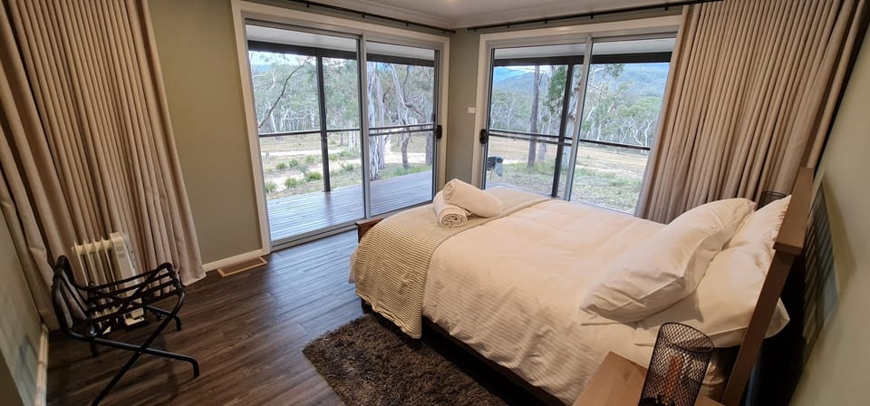 Bedroom one with queen bed