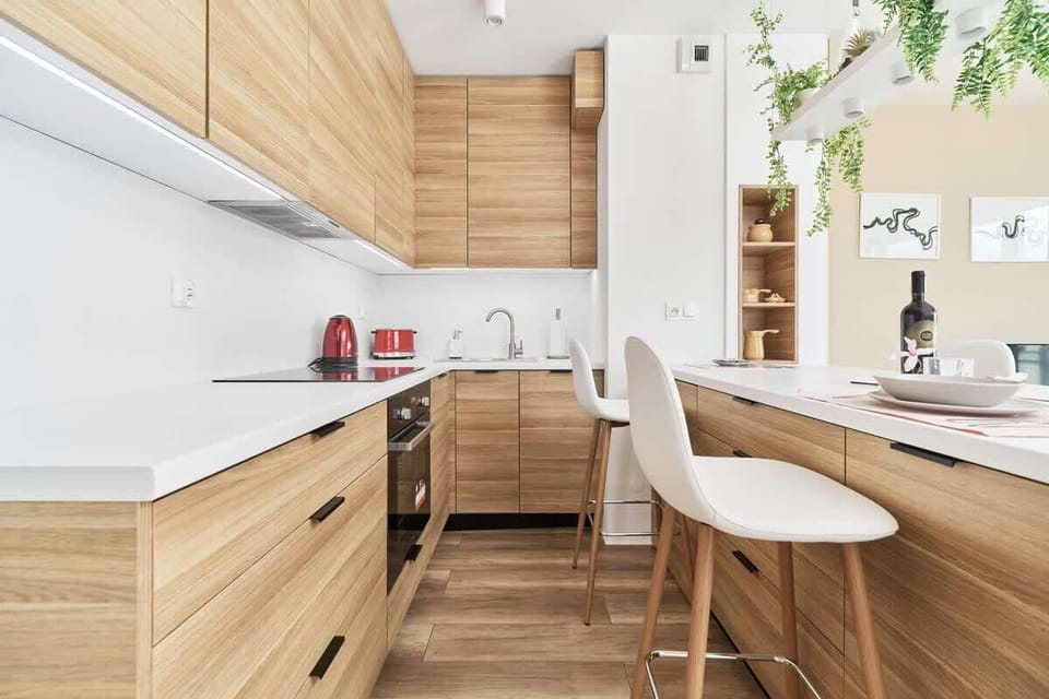 Another angle of the dining space, emphasizing its open layout and clean, modern design.