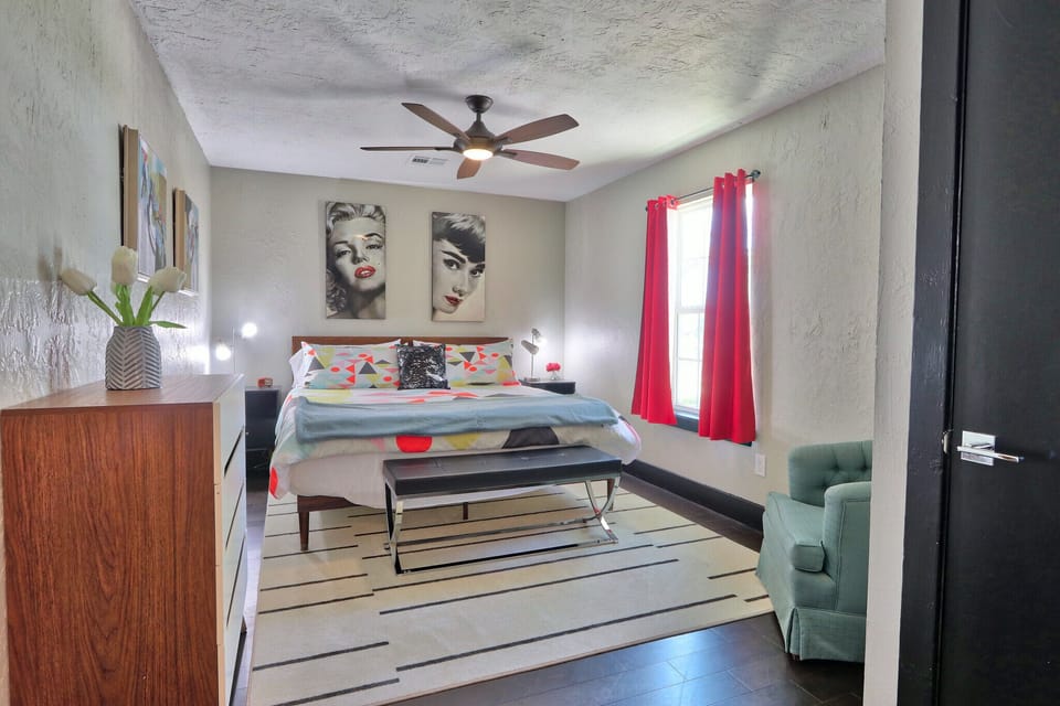 Private bedroom with a king bed