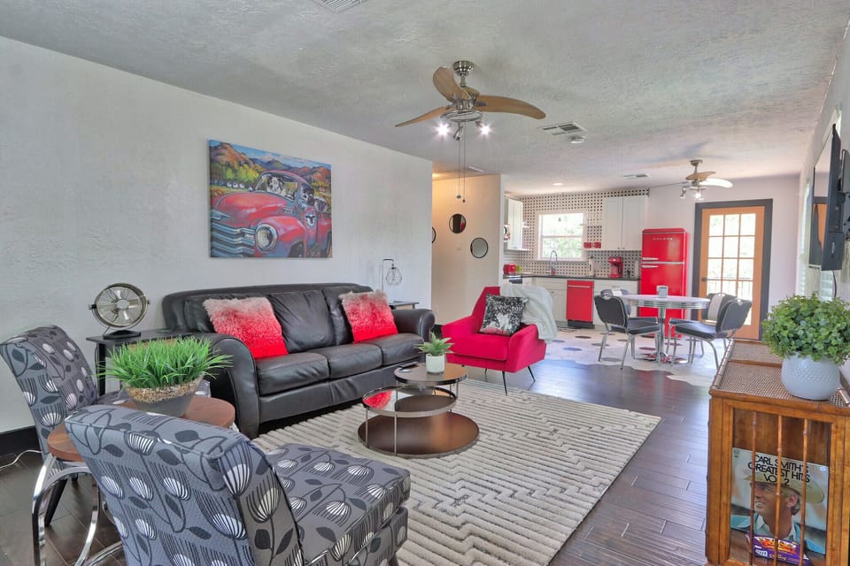 Open concept living area with full sofa sleeper