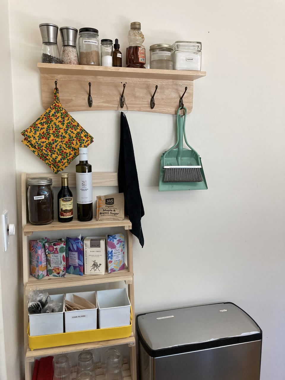 Well stocked with coffee, tea and condiments.