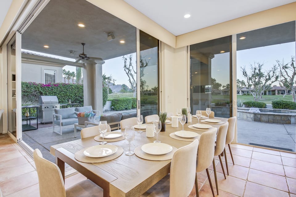 Enjoy your favorite meal on the casual dinning table with room for ten.