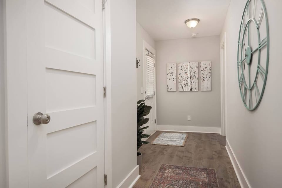 Hallway to Master bedroom and back porch