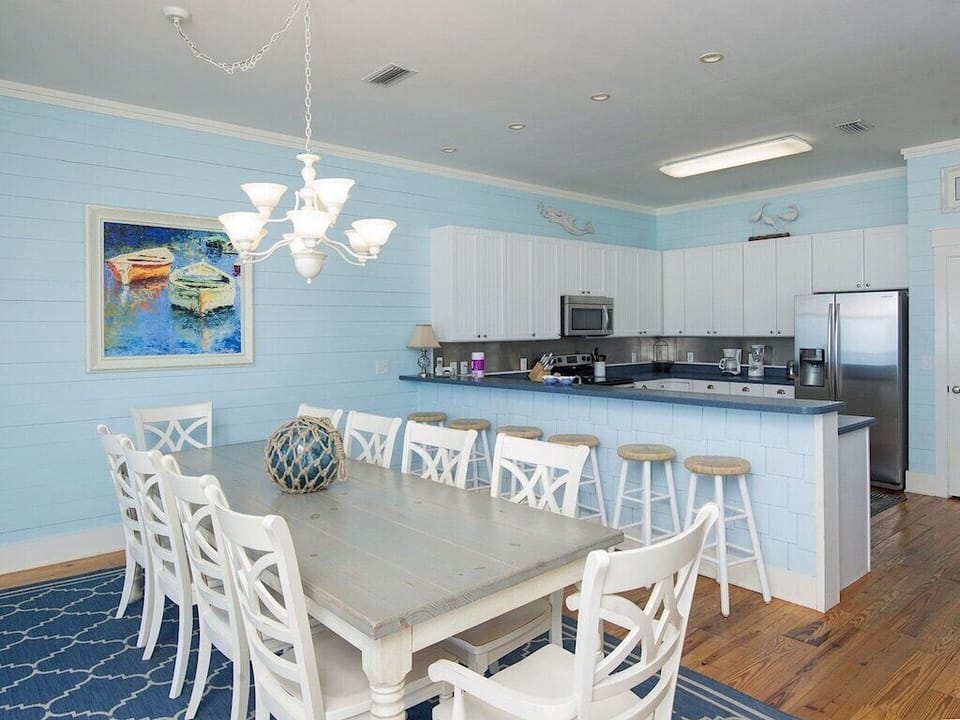 Dining table and barstools provide plenty of seating