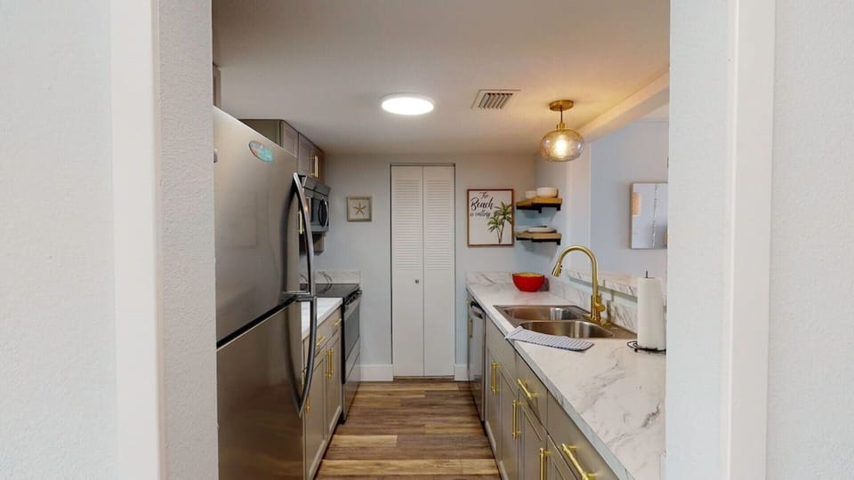 New kitchen including dishes and cookware