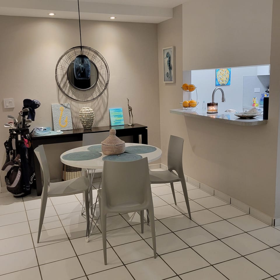 Dinning Room w/ open window to kitchen