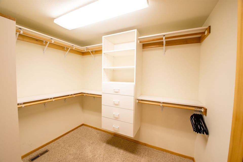 Downstairs Primary Bedroom Walk in Closet