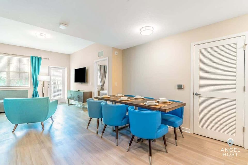 Open living area combining the dining and living room.