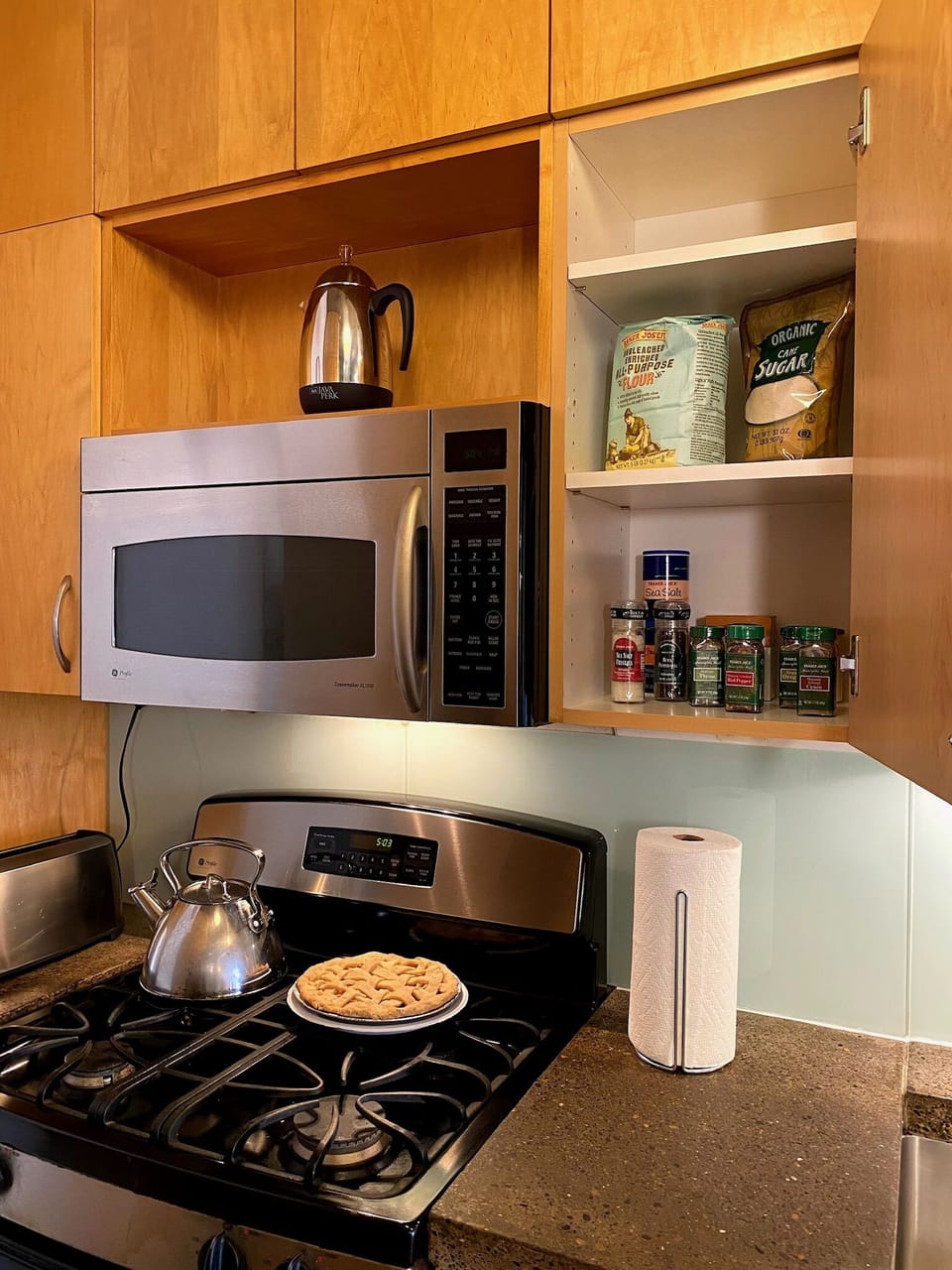 Full size appliances including gas range, oven, and microwave oven.