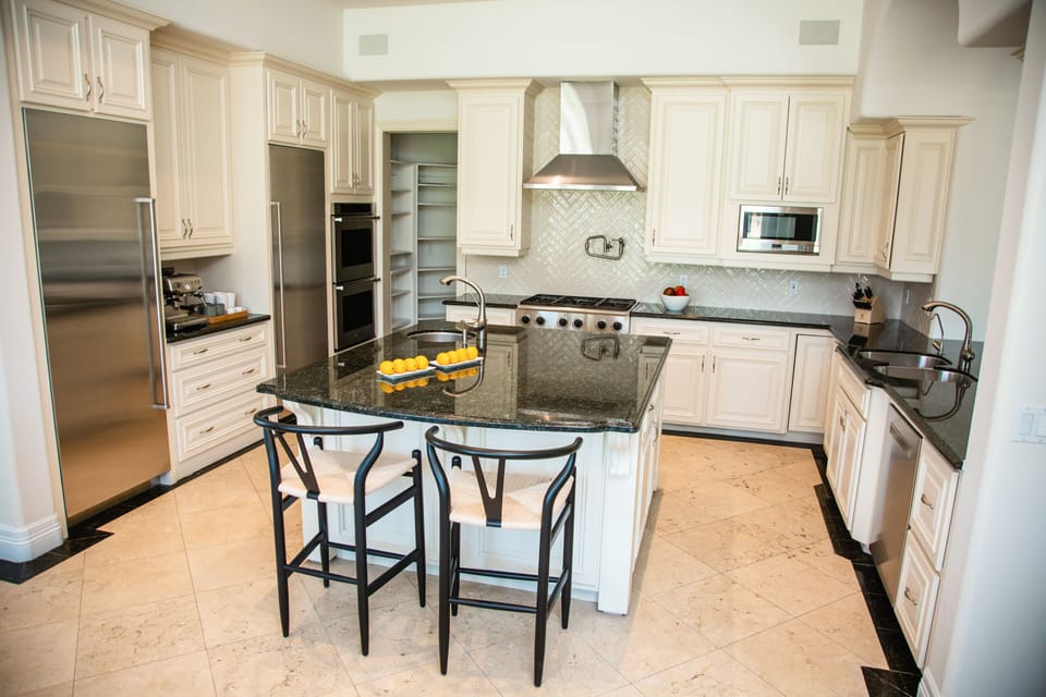 Gourmet kitchen with every possible appliance and gadget.