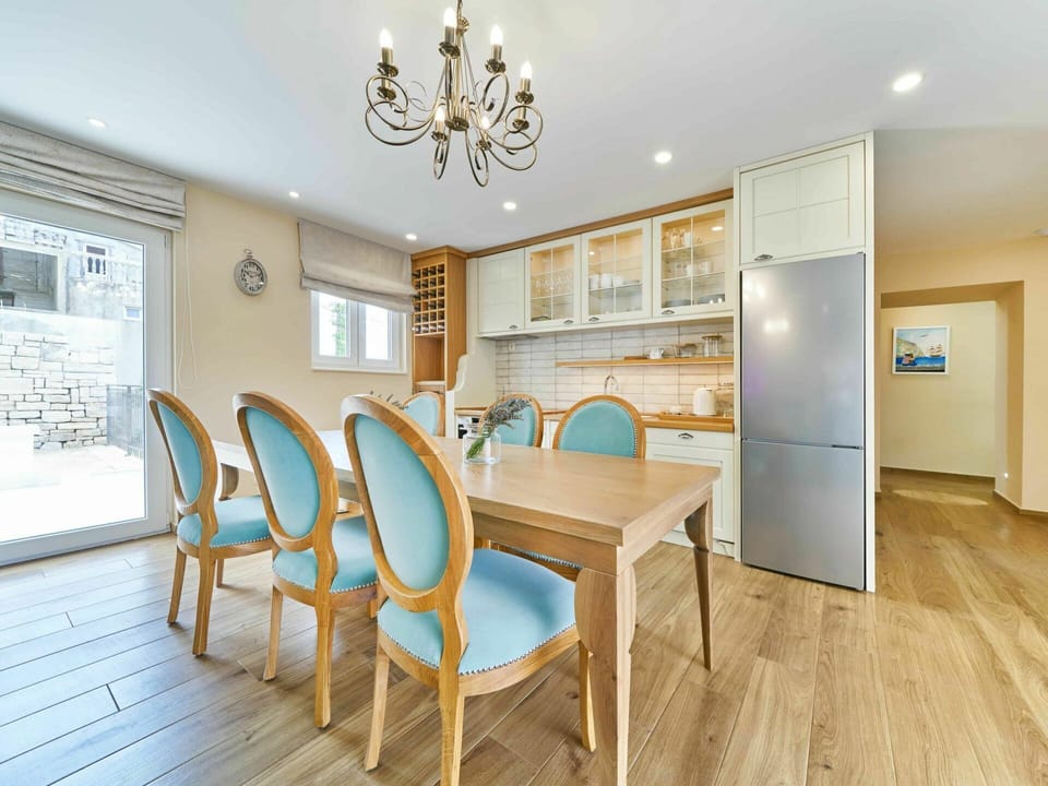 Furniture, Table, Cabinetry, Building, Chair, Azure, Wood, Lighting, Interior Design, Flooring