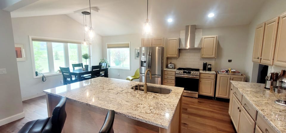 Large kitchen island and dining area for large family meals