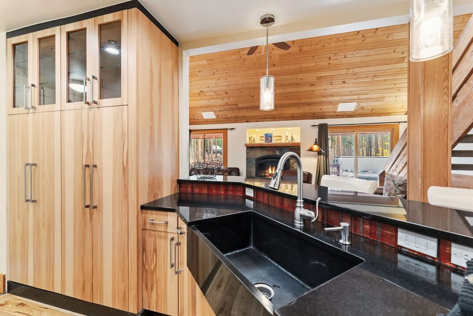 Kitchen: Viking appliances, drip coffee maker, Keurig, cooking utensils, tableware, bar seating