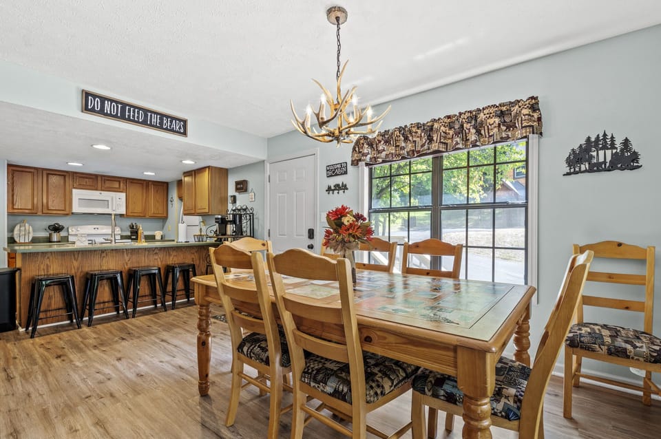 Never miss a moment in this kitchen that is open to dining area and family room.
