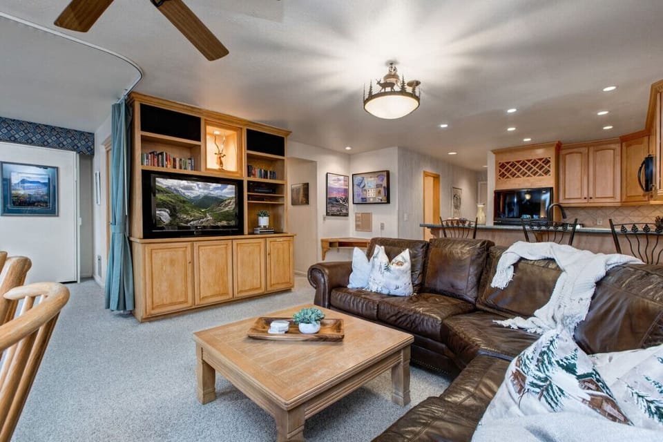 Stay entertained with your favorite shows, sports, or movies – all from the comfort of the spacious leather sofa