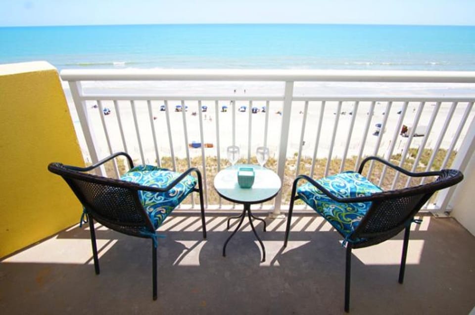 Enjoy an evening cocktail out on your private balcony.