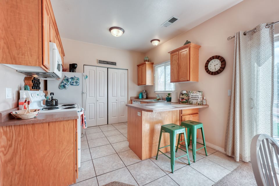 Prepare some breakfast and eat at the kitchen counter on the barstools.