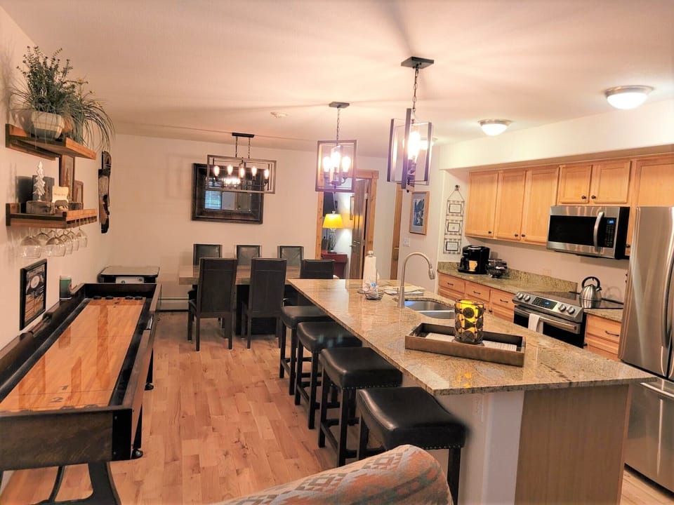 Kitchen/dining area showing shuffle board