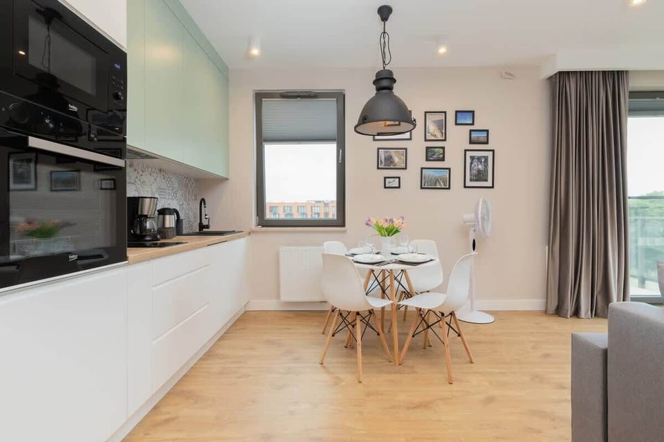 The living room's sleek design is both functional and aesthetically pleasing.
