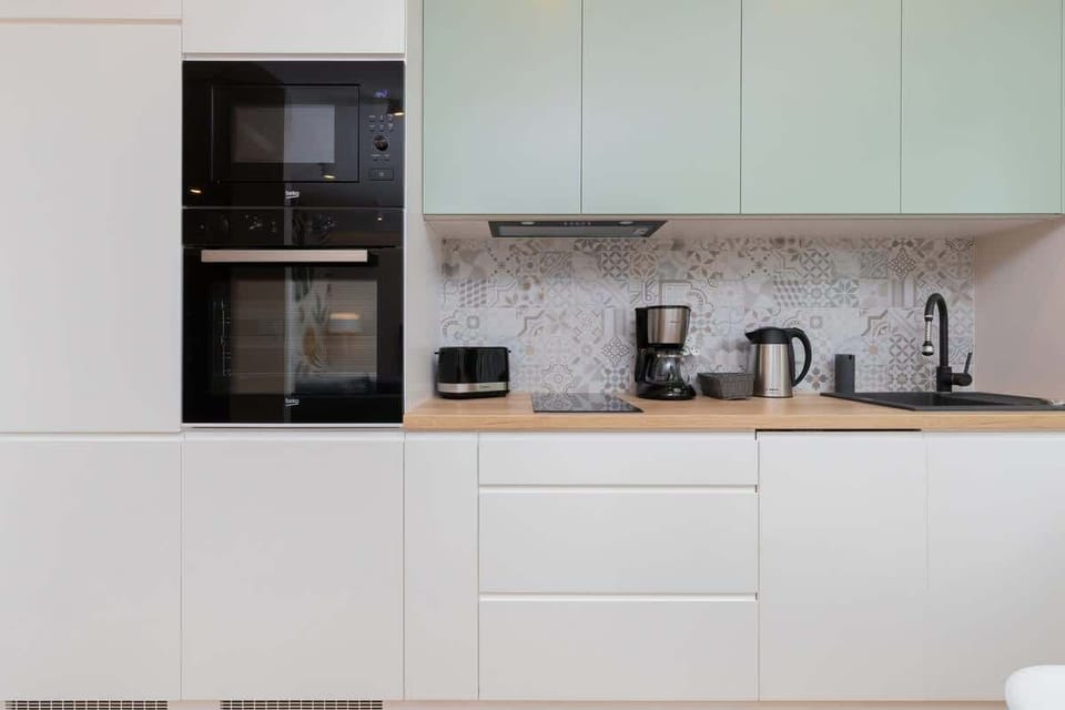 The kitchenette's practical layout maximizes space and functionality.