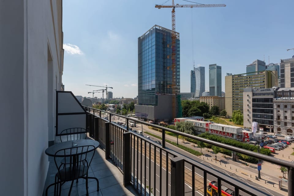 The balcony provides a serene environment for relaxation. 