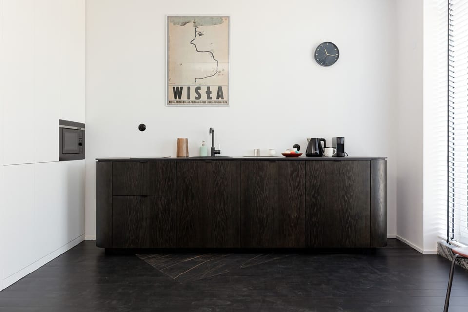 The fully equipped kitchenette includes everything you need for a home-cooked meal.