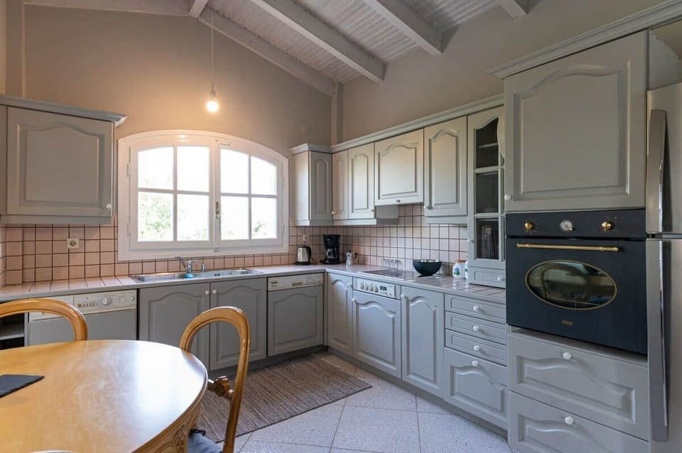 The villa offers a fully equipped kitchen
