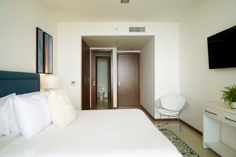 Master bedroom w/ balcony access